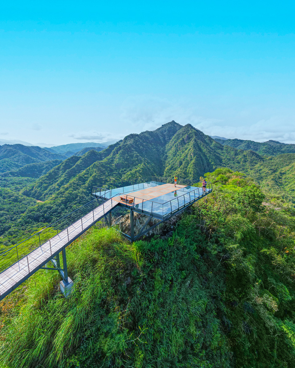 Hanging lookout over the jungle of the Riviera Nayarit, surrounded by mountains